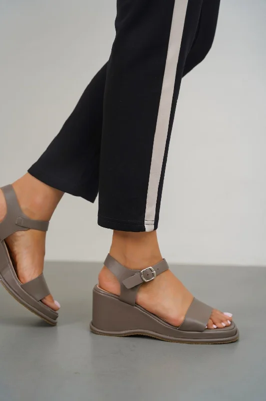 Bold and unique women's shoes for fashion-forward individualsWEDGE MAMA SANDALS