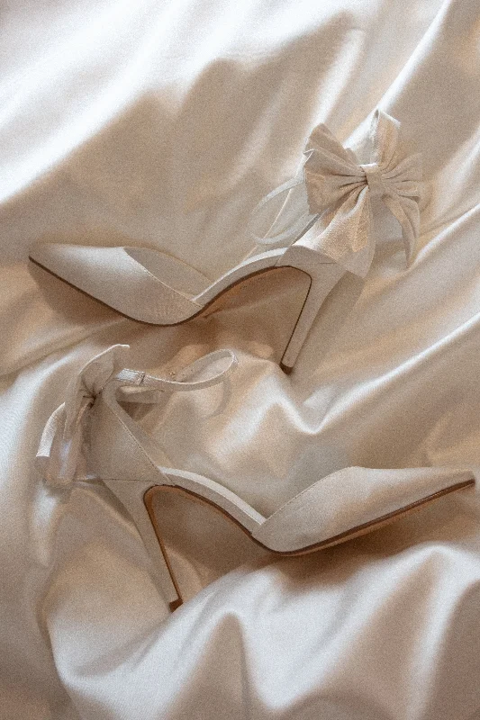 Stylish and comfortable women's shoes for long days at workCharmed Satin Bow Heel - White